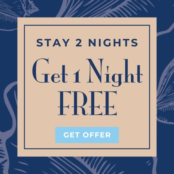 The image is an advertisement for a hotel promotion: "Stay 2 Nights, Get 1 Night Free," with a button to "Get Offer."